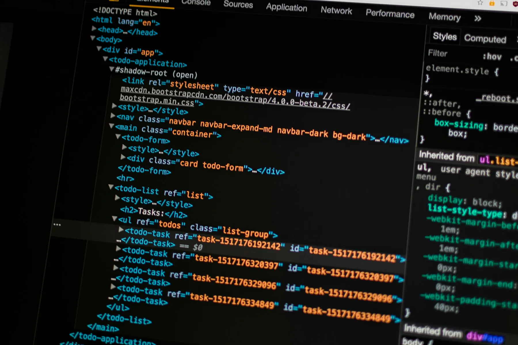 Source code and developer tools open on a dark screen